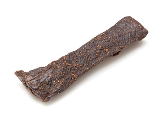 Beef Biltong, South African Beef Jerky isolated on a white studio background.
