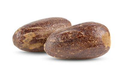 dry nutmeg on white background