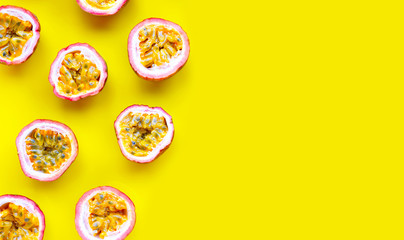Passion fruit on yellow background.