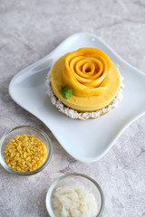 Mango Mousse tart with sticky rice and fresh mango.