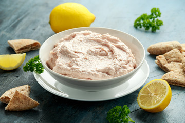 Taramasalata dip made with fish roe in white bowl