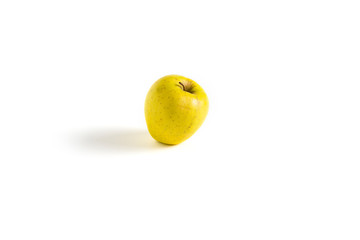 Isolated yellow apple on white background.