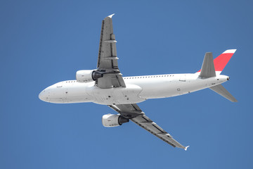Fototapeta na wymiar Passenger Airplane in the Sky
