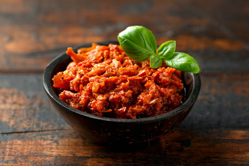Sun dried tomato pesto with chilli, garlic and herbs in bowl