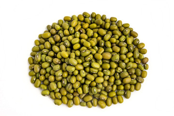 A pile of raw mung bean on white background