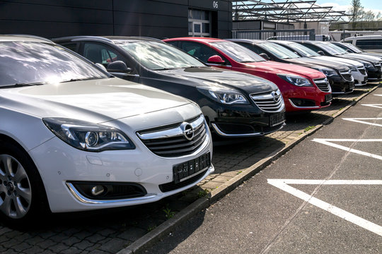 Nurnberg, Germany - OPEL cars parked in front of car dealer. view of parked luxury cars in row.	