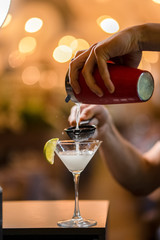 Daiquiri with lemon on summer terrace bokeh