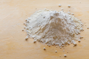 Products for dough, flour, sugar on the board.