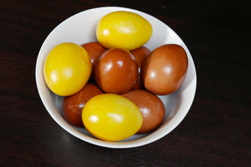 Painted eggs with turmeric and onion husks for the holiday of Bright Easter