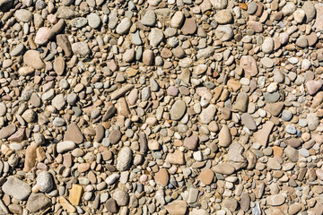 Pebble beach as a natural texture of stones.