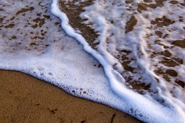 ocean wave with foam and bubbles