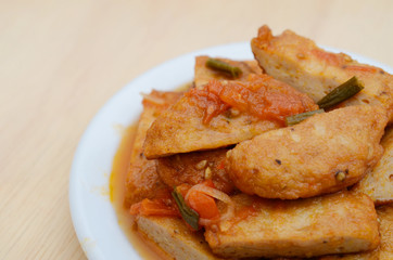 fried eating fishcakes (cha ca) top view
