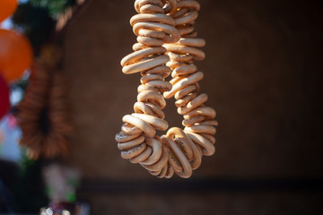 Bagels whist on a rope.