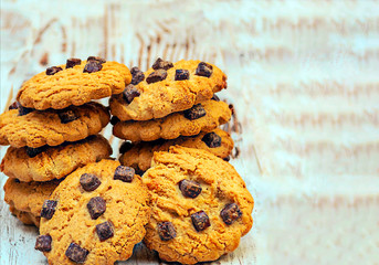 Chocolate cookies surrounded by rustic background