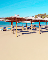 Umbrellas on a beach in Andalusia in a sunny day
