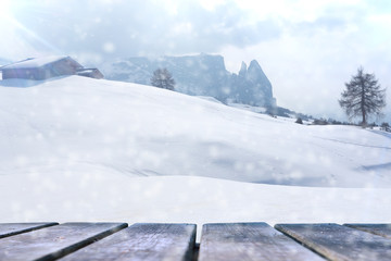 Empty wooden base suitable for mockup. Snow background theme.