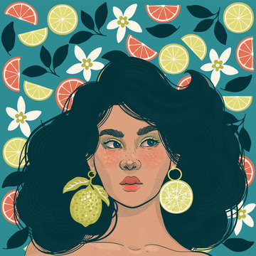 beautiful girl with earrings in the form of juicy limes on the background of fresh citruses and flowers 
