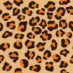 Leopard seamless pattern. Vector animal print. Brown and yellow spots on a beige background. Jaguar, leopard, cheetah, panther fur. Leopard skin imitation can be painted on clothes or fabric.