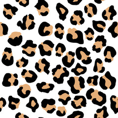 Leopard seamless pattern. Vector animal print. Black and beige spots on a white background. Jaguar, leopard, cheetah, panther fur. Leopard skin imitation can be painted on clothes or fabric.