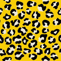 Fototapeta na wymiar Leopard seamless pattern. Vector animal print. Black and white spots on a yellow background. Jaguar, leopard, cheetah, panther fur. Leopard skin imitation can be painted on clothes or fabric.