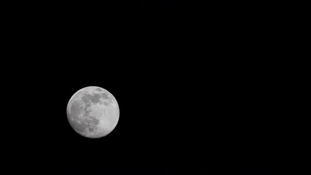 A timelapse of the Moon moving through the night sky