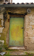 An old door in a derelict building in the historic hill village of Stanjel in the Komen municipality of Primorska, south west Slovenia.
