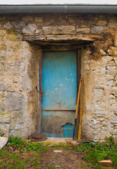 An old door in a derelict building in the historic hill village of Stanjel in the Komen municipality of Primorska, south west Slovenia.
