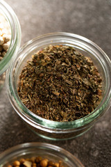 Spice and herb in glass container 