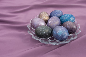 Painted easter eggs on a plate