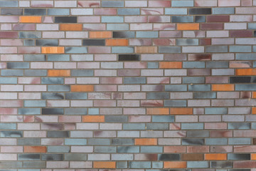 Dutch clinker dark bricks pattern in different tones of orange grey and red