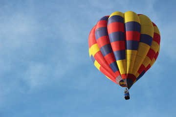 Multi Coloured Hot Air Balloon In Flight Close Up 