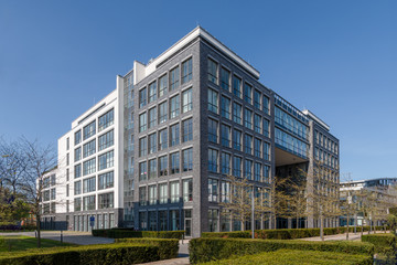 Modern architecture office building with dark bricks and big windows