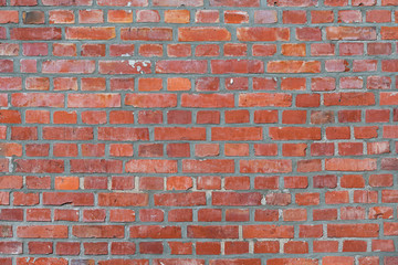 Texture of old red brick wall dutch clinker in different tones in cold light