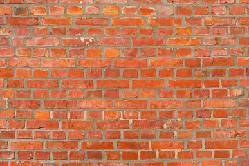 Texture of old red brick wall dutch clinker in different tones