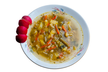 Vegetable soup and fresh radishes.