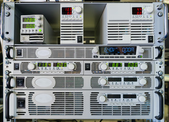Programmable AC and DC power supplies installed in the rack