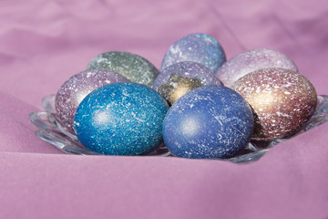Painted easter eggs on a plate