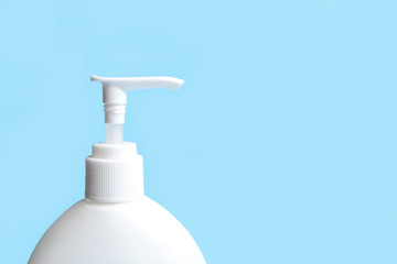 Fototapeta na wymiar White plastic bottle with hand sanitizer gel for hand hygiene corona virus protection.