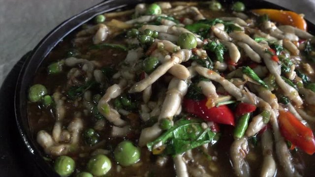 Solenidae Spicy Stir Fried Razor shell or Scallops, fried tubes are starters Thai food