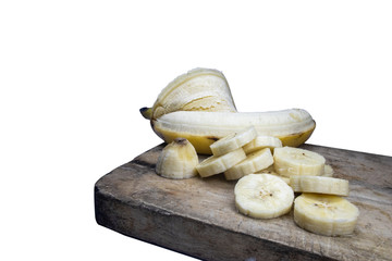 Sliced ​​bananas, laid on a wood, with a white background