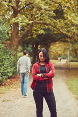 Obraz premium Beautiful woman waiting for her boyfriend outdoors. Love concept.
