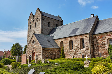 Fototapeta na wymiar Aa Church (Aa Kirke) - a Romanesque church dating from the 12th century in Aakirkeby, Bornholm island, Denmark