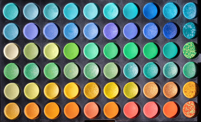 Eyeshadow palette, top view, seamless cosmetics abstraction