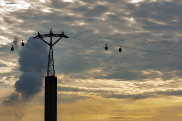 Obraz premium Night shot silhouette image of singapore cable car in Sentosa, Singapore, March 30, 2020