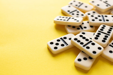 domino pieces on the yellow background