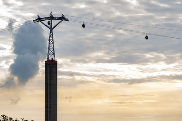 Obraz premium Night shot silhouette image of singapore cable car in Sentosa, Singapore, March 30, 2020