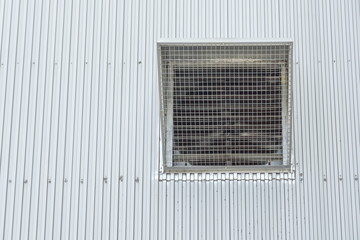 Air funnel in factory wall, metal sheet