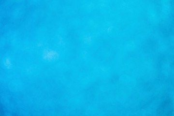 The Abstract blur blue bokeh lighting from glitter texture,Defocused lights background (blue) 