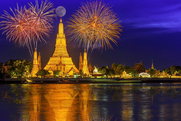 Firework countdown celebration display over temple of dawn on the Chao Praya riverside.New year...