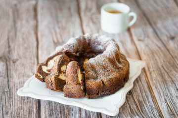 Gugelhupf bundt cake with cherries and cheesecake filling